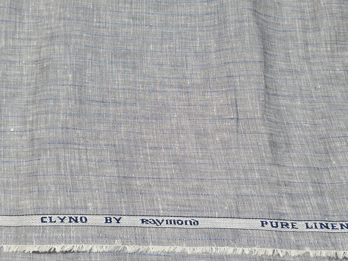 Raymond 100% Linen 60 lea self small stripes shirting fabric