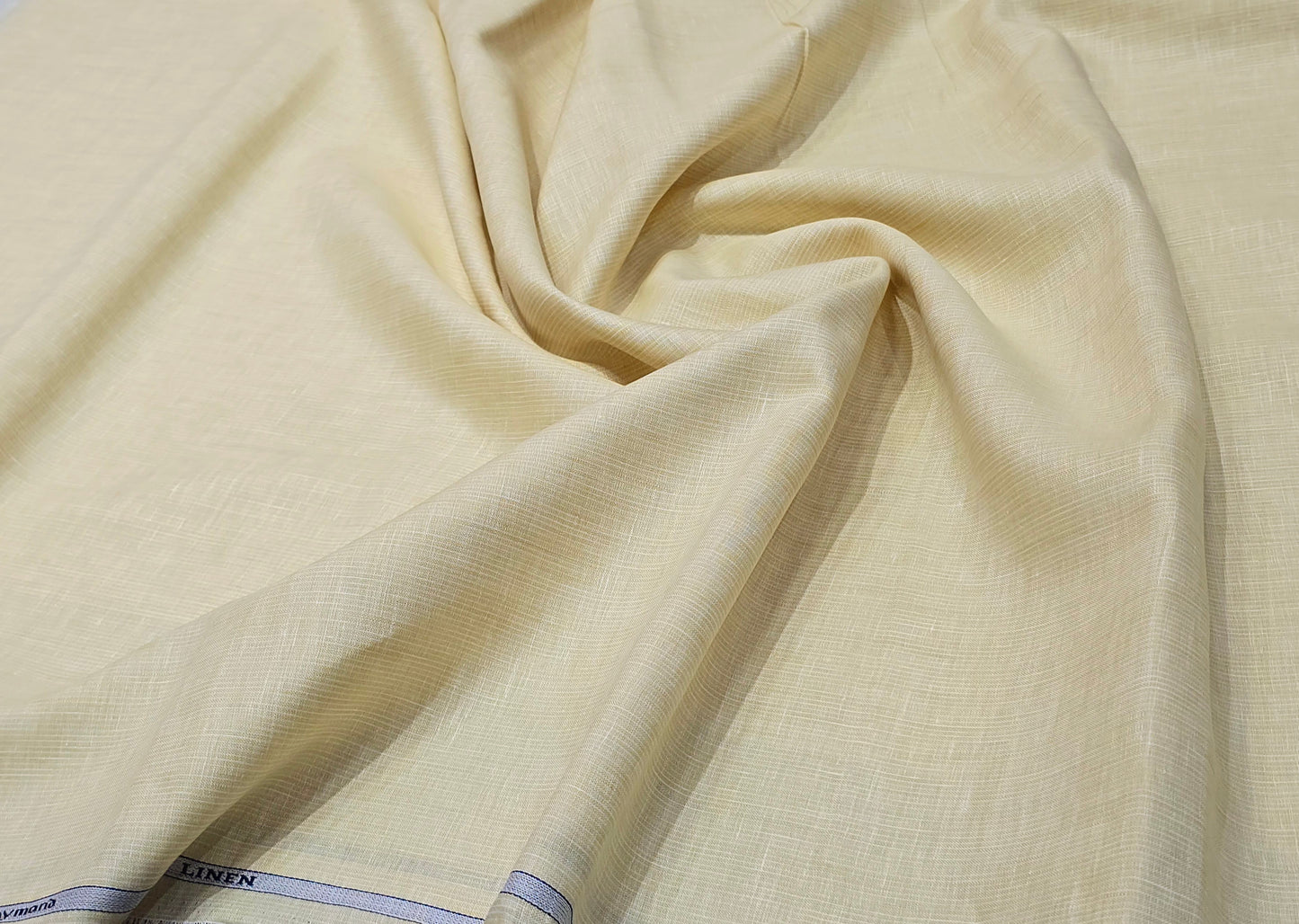 Raymond 100% Linen 70 lea plain self design shirting fabric